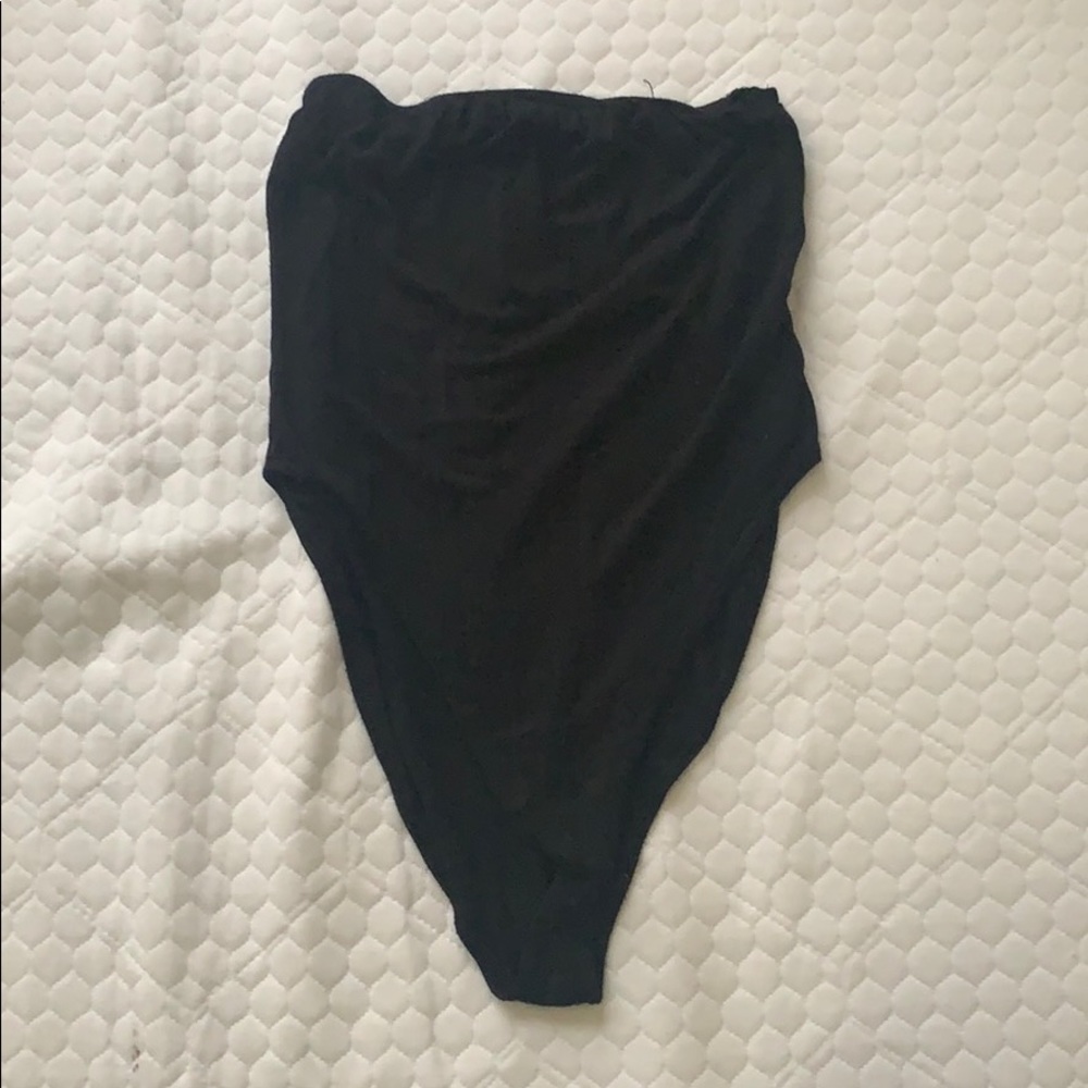 Black tube top body suit.